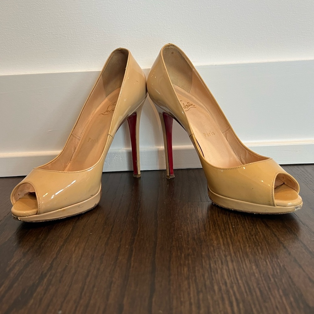 Christian Louboutin tan pumps